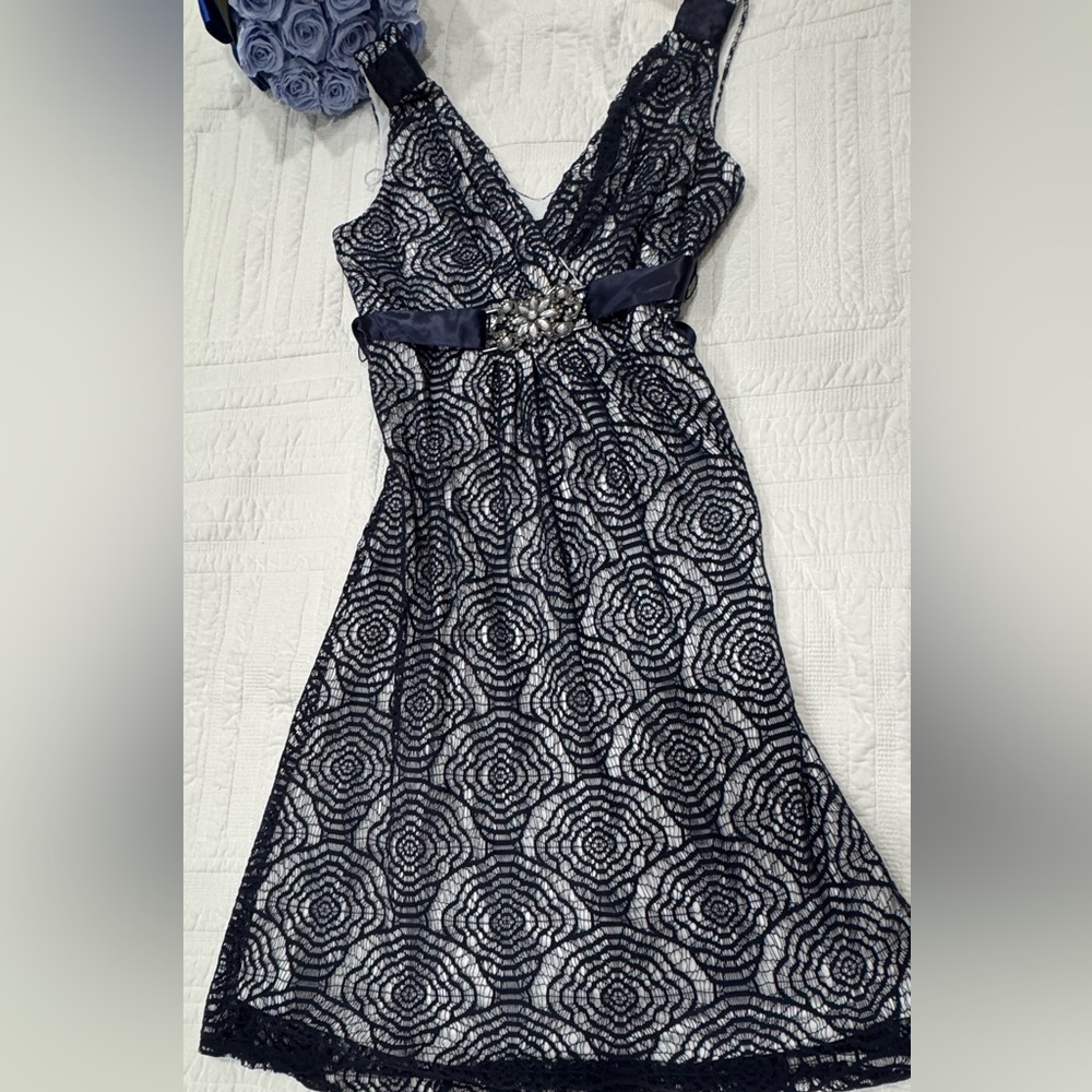 Elegant Navy Lace Dress with Embellished Waist